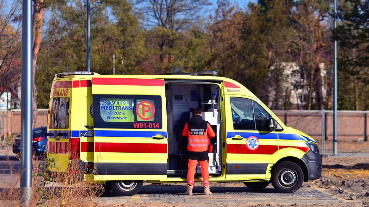 Warsaw, Poland. 5 November 2024. Close-up of ambulance van parked at town square  on a sunny day.